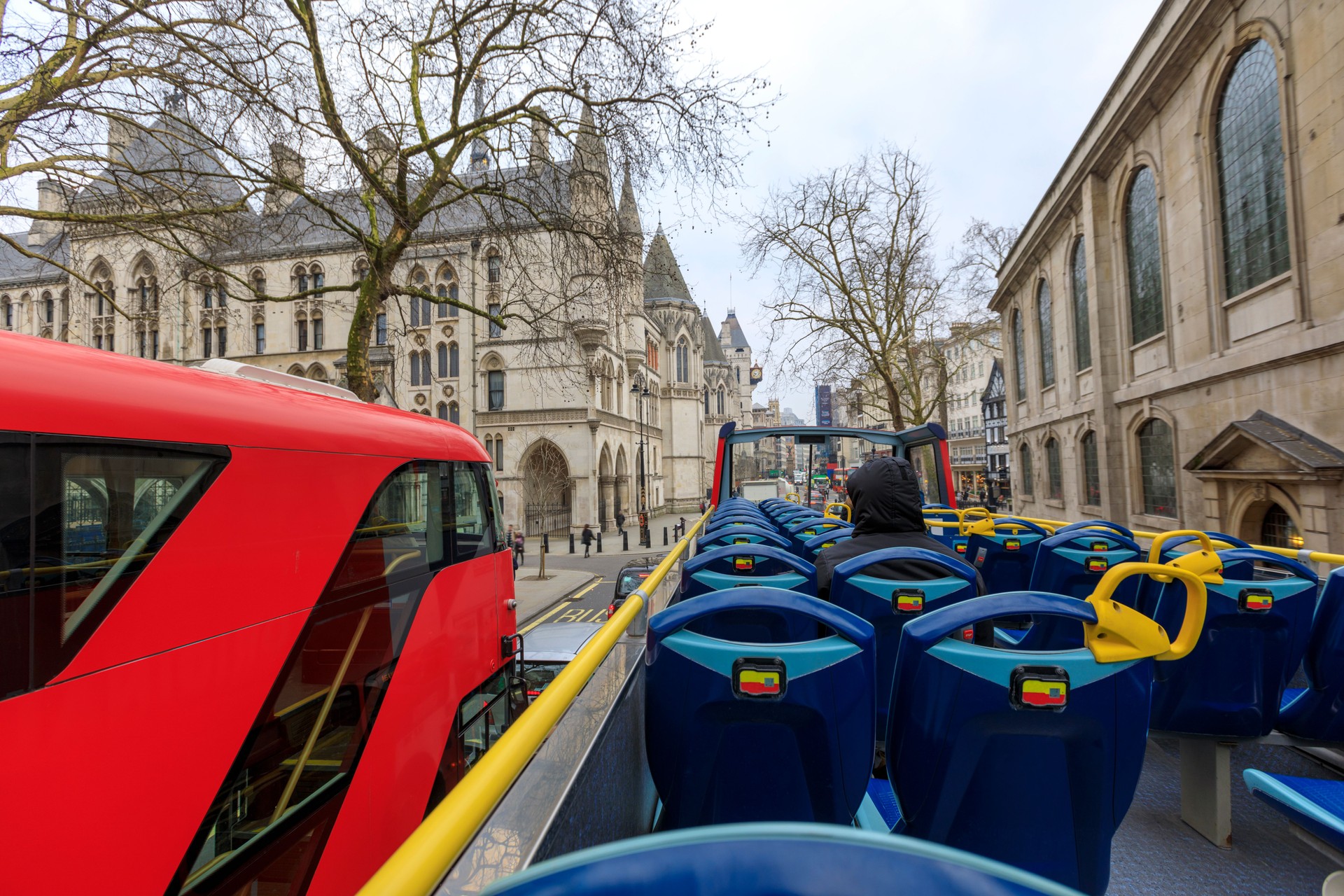 Tourists enjoying the ride on a Tour Bus in London